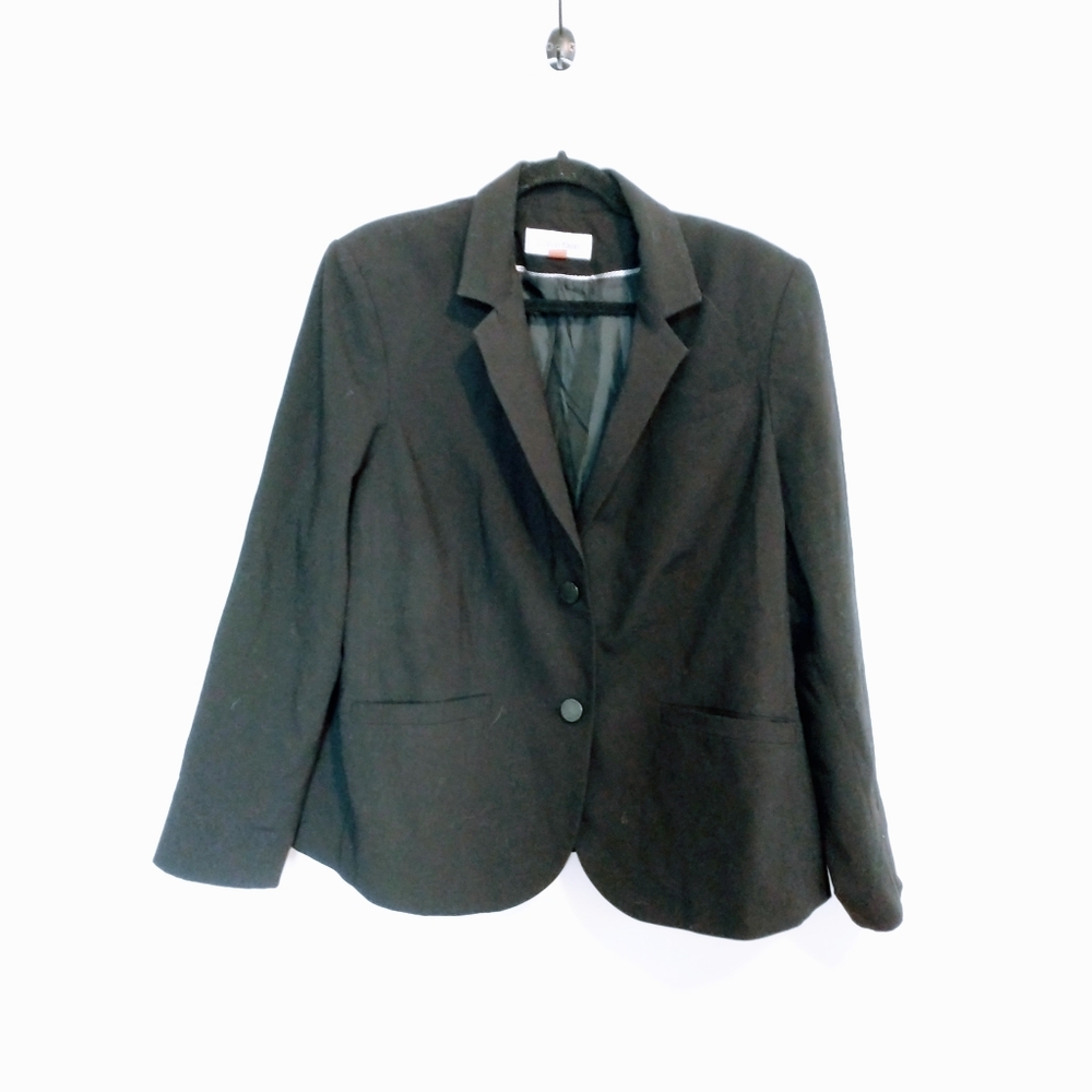 Calvin Klein black blazer with button closure front and pockets.  Size tag worn,